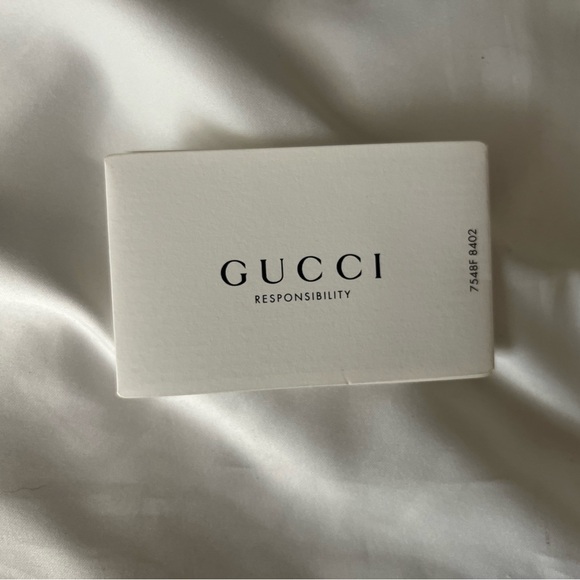 Gucci Black Baby Bag with Monogram Design